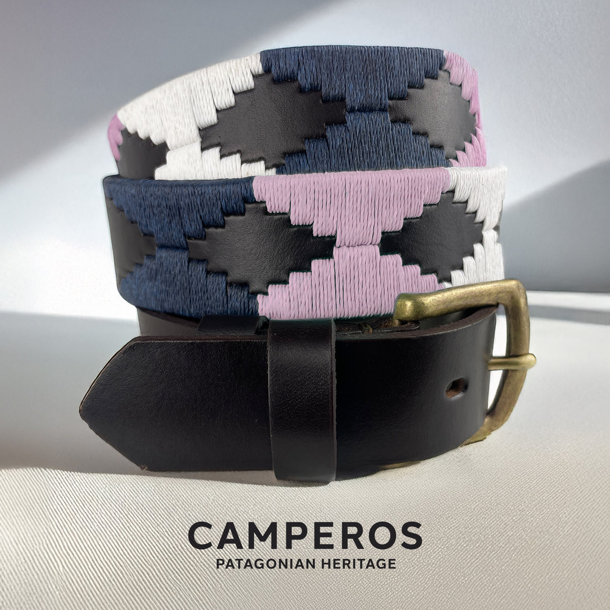 Handcrafted leather polo belt with Blue, White & Pink thread embroidery and bronze buckle, by Camperos